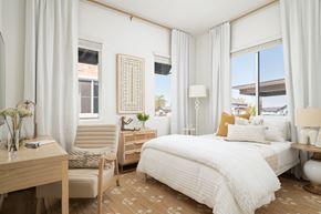 Maricopa apartment for rent - a bedroom with a bed and two windows