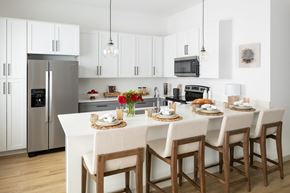 Maricopa apartment for rent - a kitchen with a large island with a white counter top