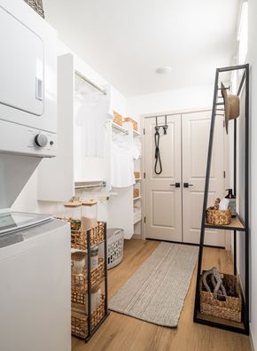 Gilbert apartment for rent - A white oven sits next to a white fridge in a small kitchen.