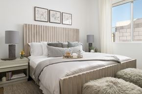 Gilbert apartment for rent - A bedroom with a large bed and a window.