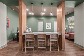 San Marcos apartment for rent - A dining room with a table and chairs.