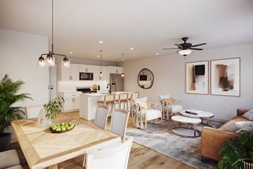 Charlotte townhouse for rent - A modern living room with a dining table and chairs.