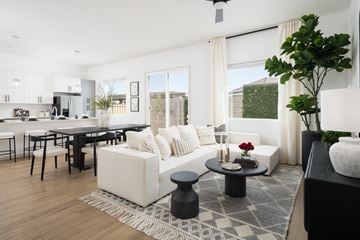 Surprise apartment for rent - A modern living room with a black coffee table and a white sofa.