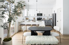 Buckeye apartment for rent - A modern kitchen with a dining table and chairs.