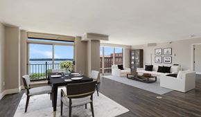 Minneapolis apartment for rent - A dining room with a table set for two and a view of the balcony.