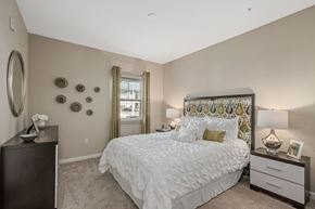 Fort Myers apartment for rent - a bedroom with a large bed and a window