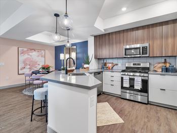 Contemporary designer fixtures in all kitchens & bathrooms