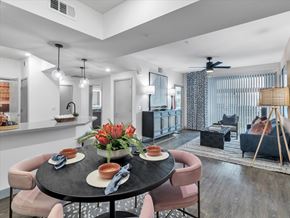 Las Vegas apartment for rent - A modern dining room with a round table set for two.