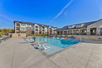 Refreshing swimming pool with lounge deck