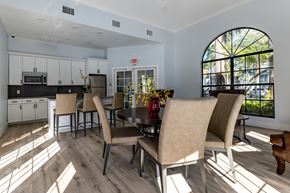 North Lauderdale apartment for rent - A dining room with a table and chairs.