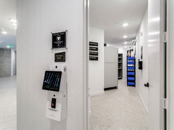 Interior mail center with access controlled package room