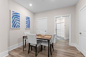 Knightdale apartment for rent - Active Adult dining room with a wooden table and chairs