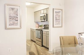 Antioch apartment for rent - a kitchen with stainless steel appliances and a glass table