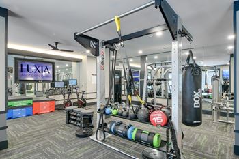Fitness studio with separate yoga suite including echelon reflect
