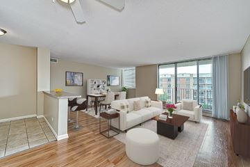 Lombard apartment for rent - A living room with a white couch and a coffee table.