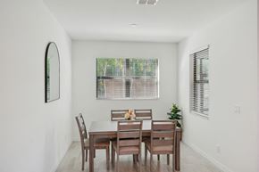 South Naples townhouse for rent - A dining room with a table set for six.