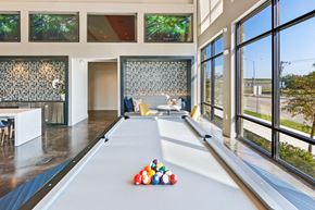 Richardson apartment for rent - a billiards room with a pool table and a lot of colorful balls