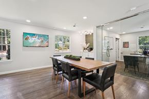Marietta apartment for rent - A dining room with a wooden table and chairs.