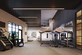 Austin apartment for rent - A gym with a variety of equipment including treadmills, weights, and exercise machines.