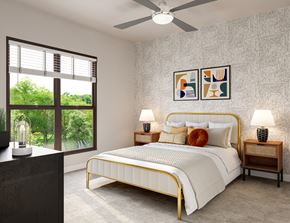 Nashville apartment for rent - A bedroom with a large bed, a ceiling fan, and a window with blinds.
