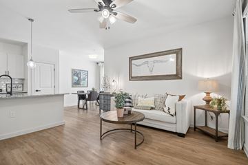 Leander apartment for rent - A living room with a white couch and a coffee table.