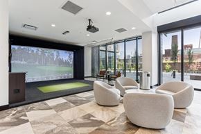 Nashville apartment for rent - A conference room with a green screen and a view of the outside.