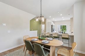 Charlotte townhouse for rent - A dining room with a table set for four.