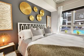 Houston apartment for rent - a bedroom with a bed and a window