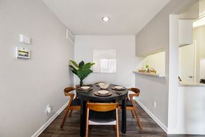 Houston apartment for rent - a dining room with a table and chairs