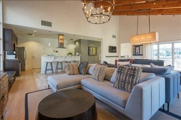 Raleigh apartment for rent - a living room with a couch and a kitchen
