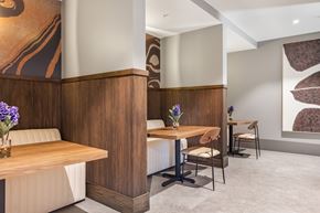 Huntsville apartment for rent - A dining area with a wooden table and chairs.