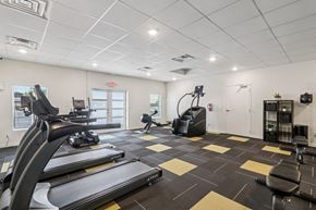 Harker Heights townhouse for rent - A gym with treadmills, elliptical machines, and other exercise equipment.