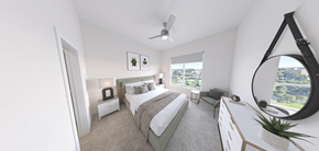 Omaha apartment for rent - A bedroom with a large bed and a view of the city.