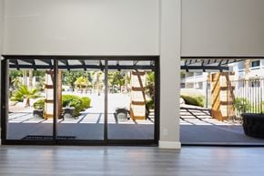 Phoenix apartment for rent - a view of the entrance to a building with glass doors