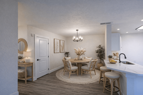 Jacksonville apartment for rent - A dining area with a round table and chairs.