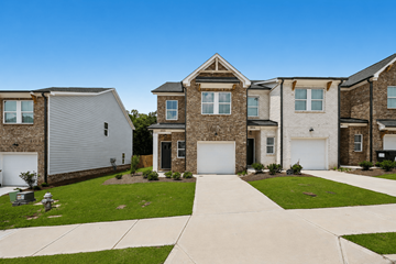 Braselton apartment for rent - A row of houses with a clear blue sky above them.