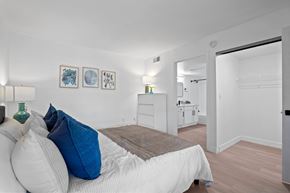 Phoenix apartment for rent - a bedroom with a bed and a closet and a bathroom