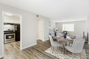 Jonesboro apartment for rent - a living room and dining room with a table and chairs