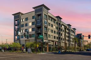 Phoenix apartment for rent - A large building with a balcony on the second floor.