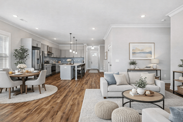Spring Hill apartment for rent - A modern living room with a dining table and chairs.