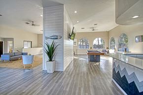 Phoenix apartment for rent - a spacious lobby with a pool table and a flat screen tv