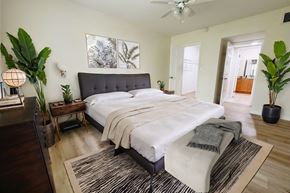 Miami Lakes apartment for rent - a bedroom with a large bed and a rug