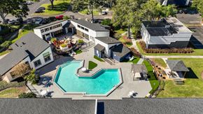 Orlando apartment for rent - a house with a swimming pool in front of it