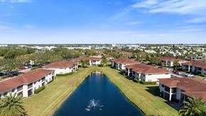 Palm Bay apartment for rent - an aerial view of houses around a pool