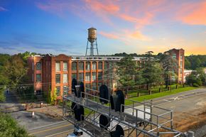 Spartanburg apartment for rent - an aerial view of a building with a water tower
