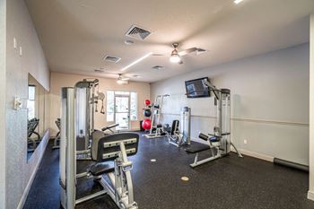 Fitness center with top-of-the-line equipment and free weights