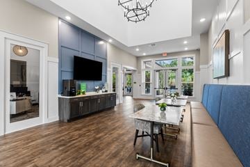 Antioch apartment for rent - A modern living room with a dining table and a television.