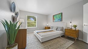Round Rock apartment for rent - a bedroom with a bed and a dresser