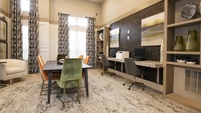 Mansfield apartment for rent - a dining room with a table and chairs and a desk with a computer