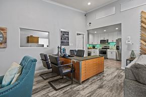 Albuquerque apartment for rent - a kitchen and living room with a desk and chairs